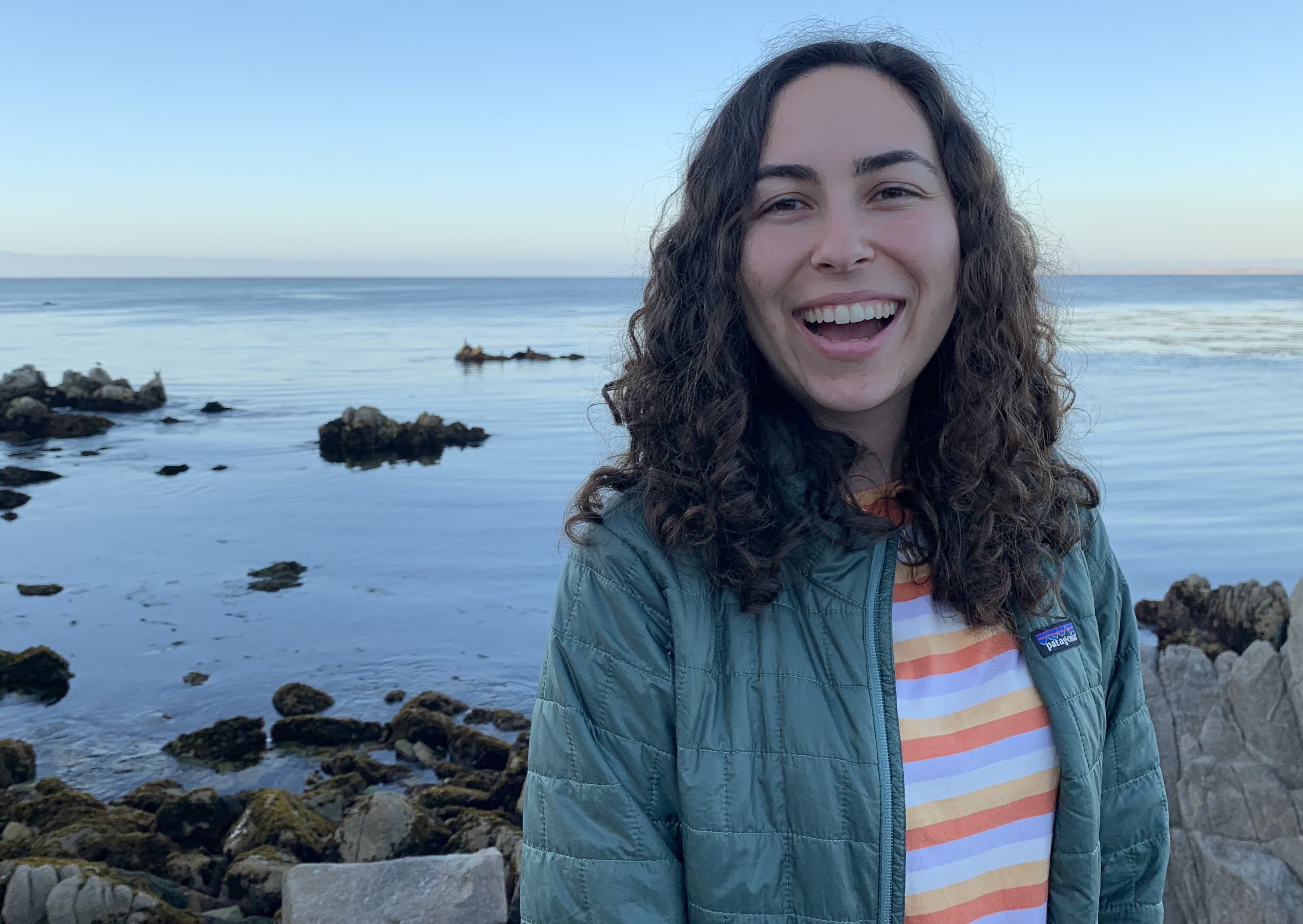 me smiling with my mouth open at the beach